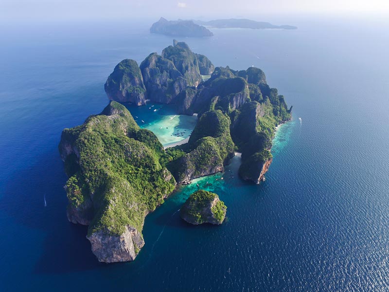 <span> DAY 03</span>Excursion to Phi Phi Island | Marvel at the Cliffs and Caves, Sandy Beaches and Turquoise Waters